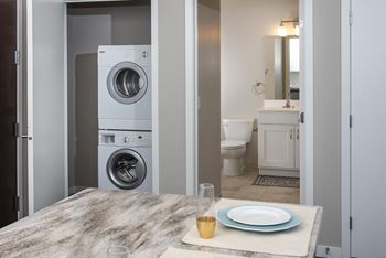 Stacked in unit washer and dryer